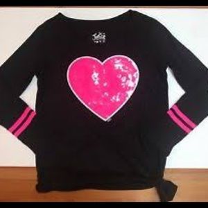 Justice “gymnast” long sleeved sequin shirt.